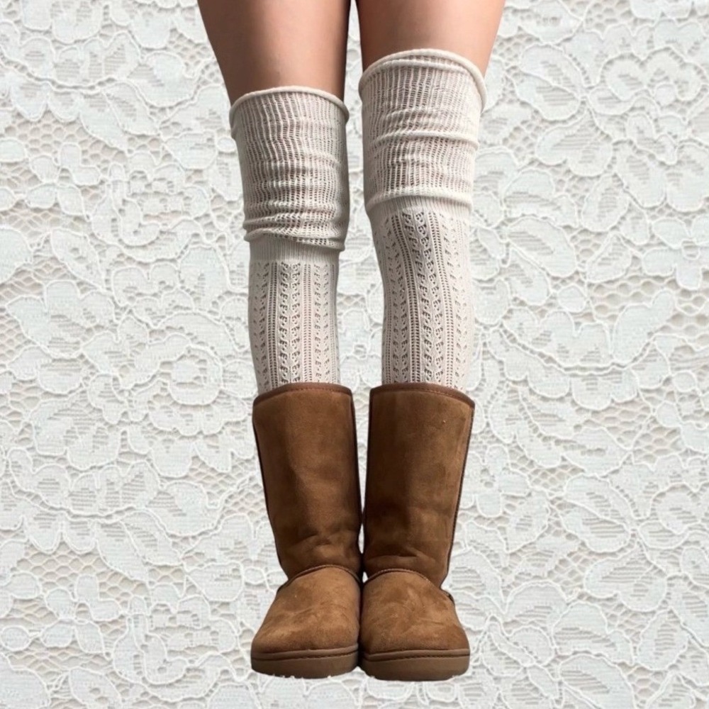 tan knee slipper boots with shearling interior